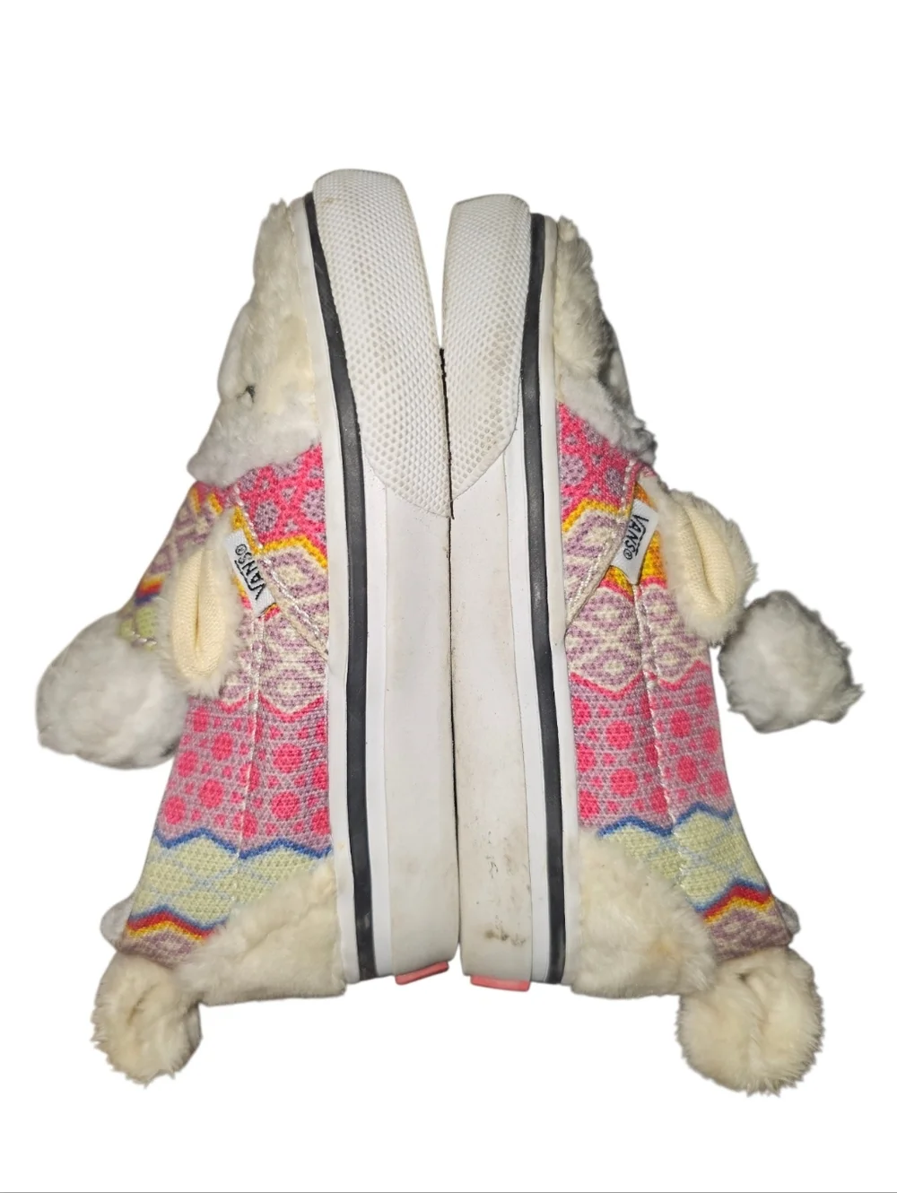 Vans Slip-On V Alpaca sneakers featuring a faux fur llama design.